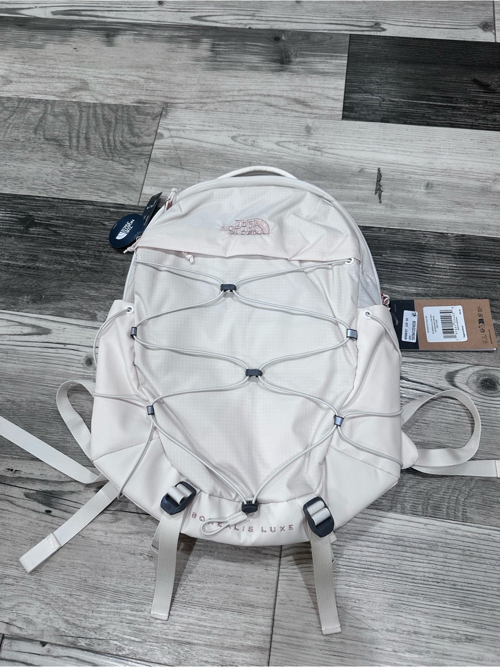 The Northface Women's 27L Borealis Luxe Backpack Gardenia White/Burnt Coral Meta